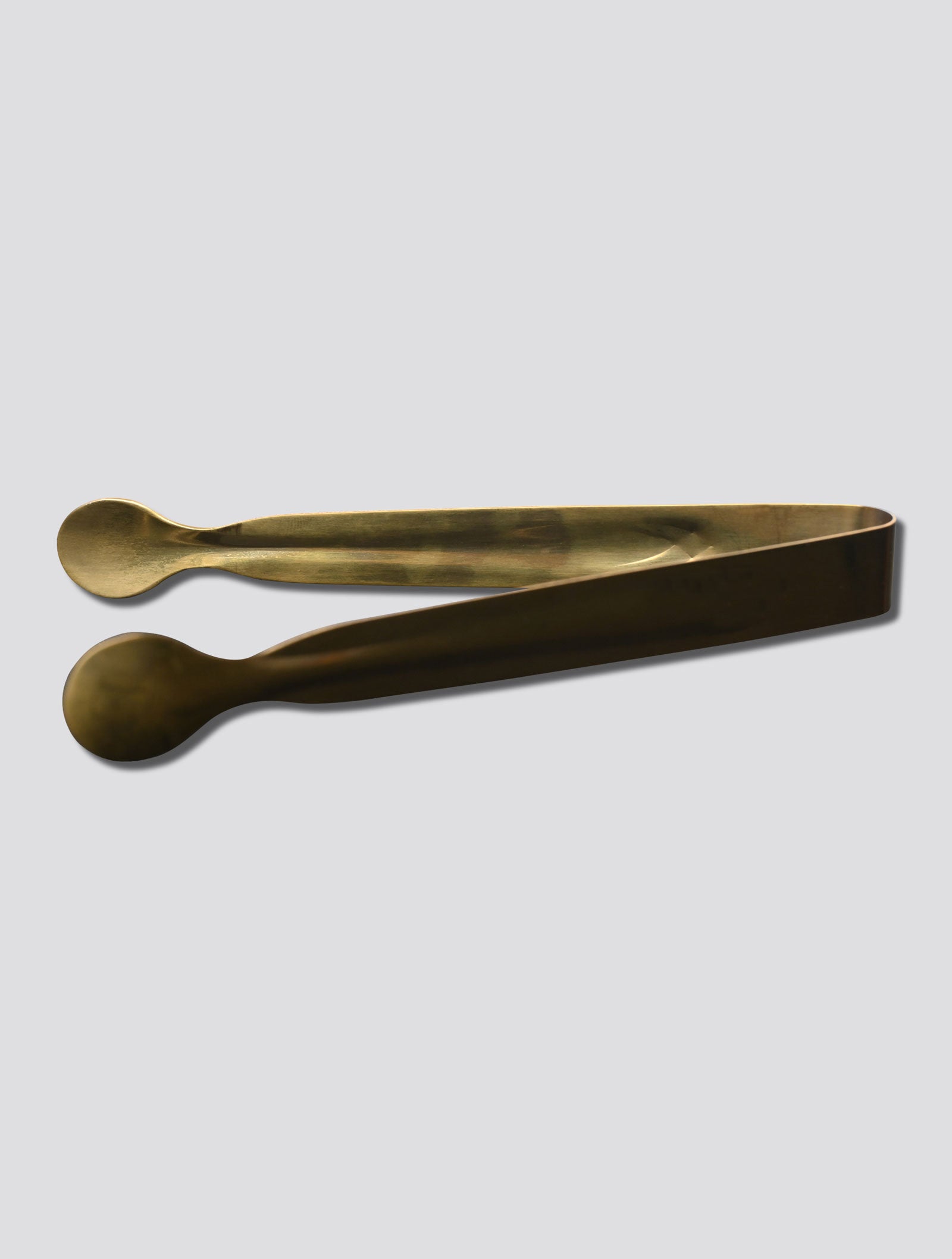 Double tongs for coals in bright gold-plated brass